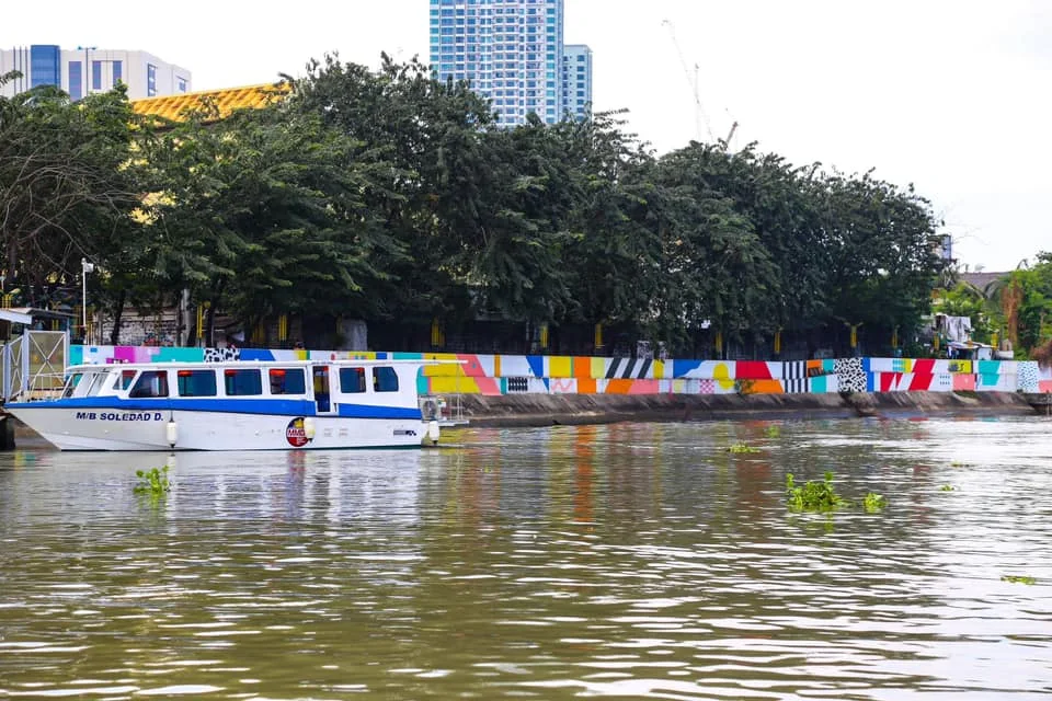 Pasig River Ferry Service and see the wide array of views and colors the metro
