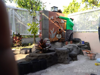 Jasa taman tebing air terjun