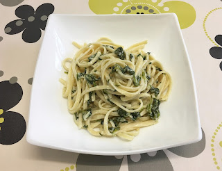 Tagliatelle with cheese sauce and spinach