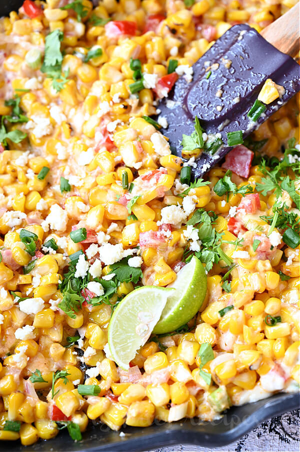 mexican street corn salad with grilled corn,chopped cilantro and cotija