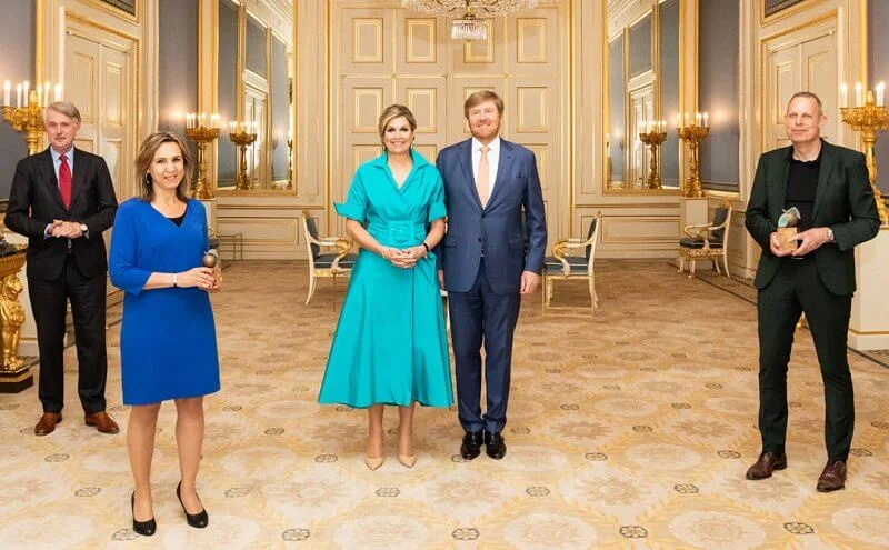 Queen Maxima wore a new blue Taffeta shirt dress from Natan, blue diamond earrings