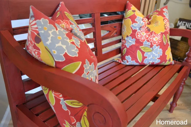 This red bench has a new life with red chalky paint and dark wax