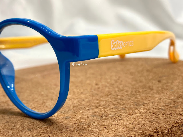 Children blue light glasses in cute blue yellow by SaferOptics