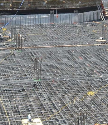 A massive mat foundation is reinforcing with steel before concreting