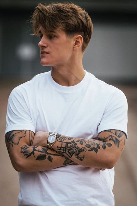 follower forearm tattoos for men
