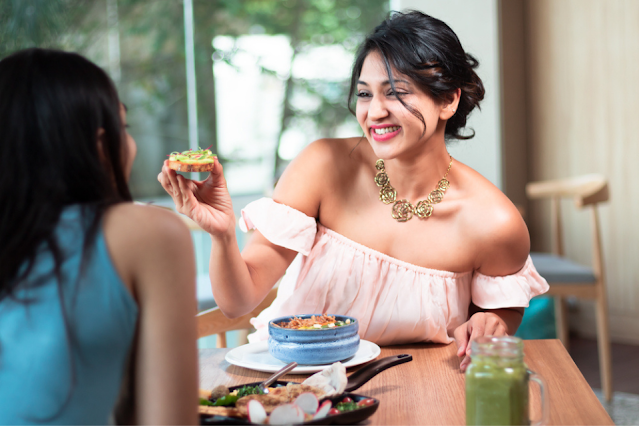 Friends eating a healthy meal together