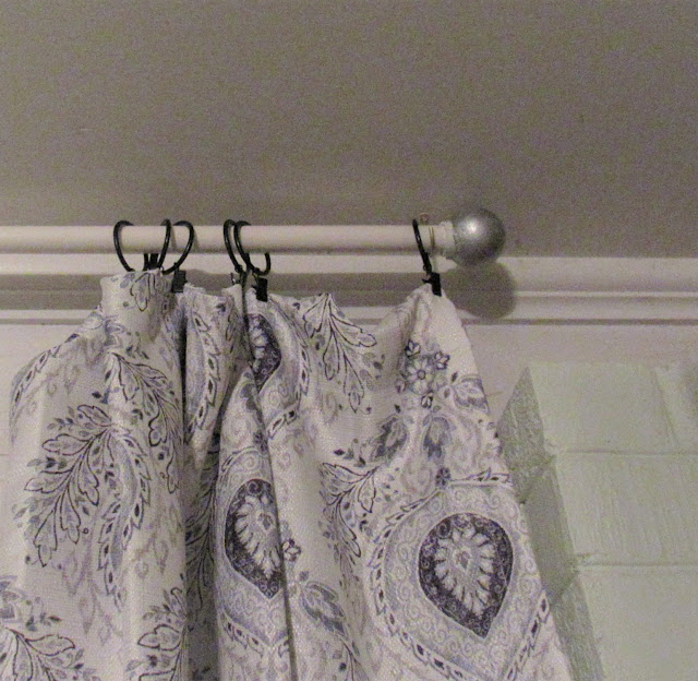 Betsy's Wildwood Home Conduit curtain rods