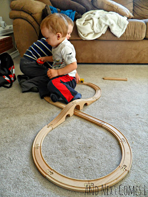 Number 8 made from wooden train tracks from And Next Comes L