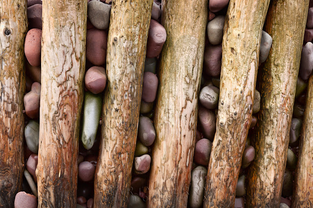 Bossington beach groynes hold back the colourful pebbles by Martyn Ferry Photography