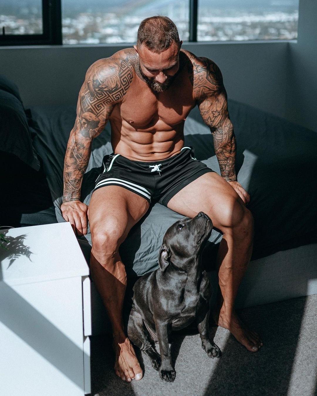 sexy-bearded-shirtless-tattoo-bodybuilder-hunk-zac-smith-dog