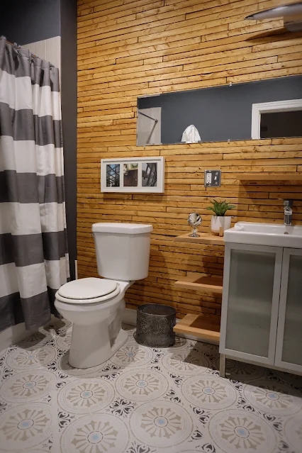 updated view of hall bathroom with multiple projects shown