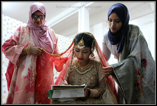 “Madhobi signs the marriage contract with her mother and sister Korobi. Centocelle Baitussalam Jame Mosque. ROME – 21 September 2020