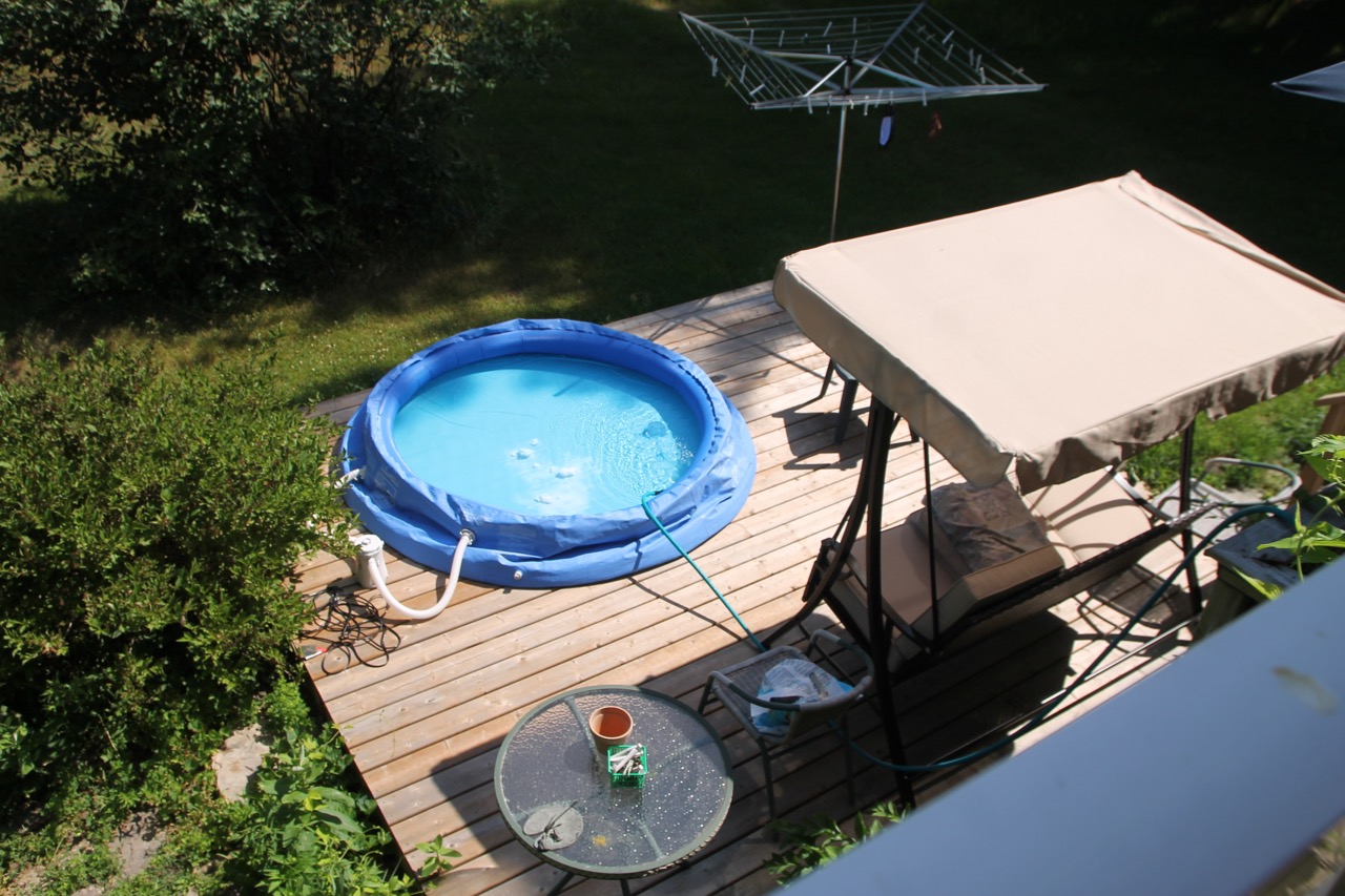 Reflections from Crumbly Acres water fountain, goldfish pond, kiddie pool