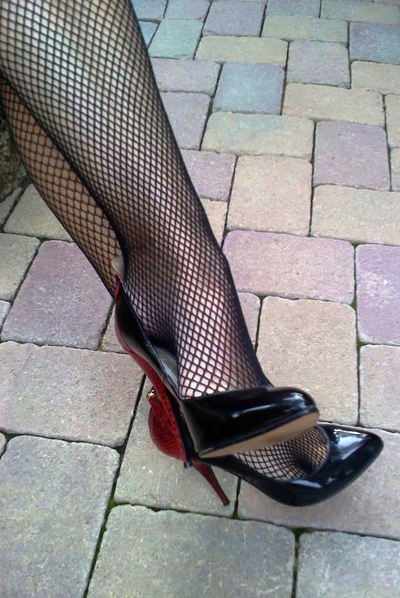 Black fishnet stockings and high heels