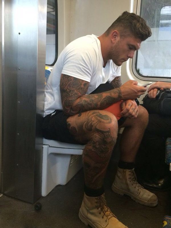hot-tube-tattoo-guy-hard-worker-strong-legs-texting