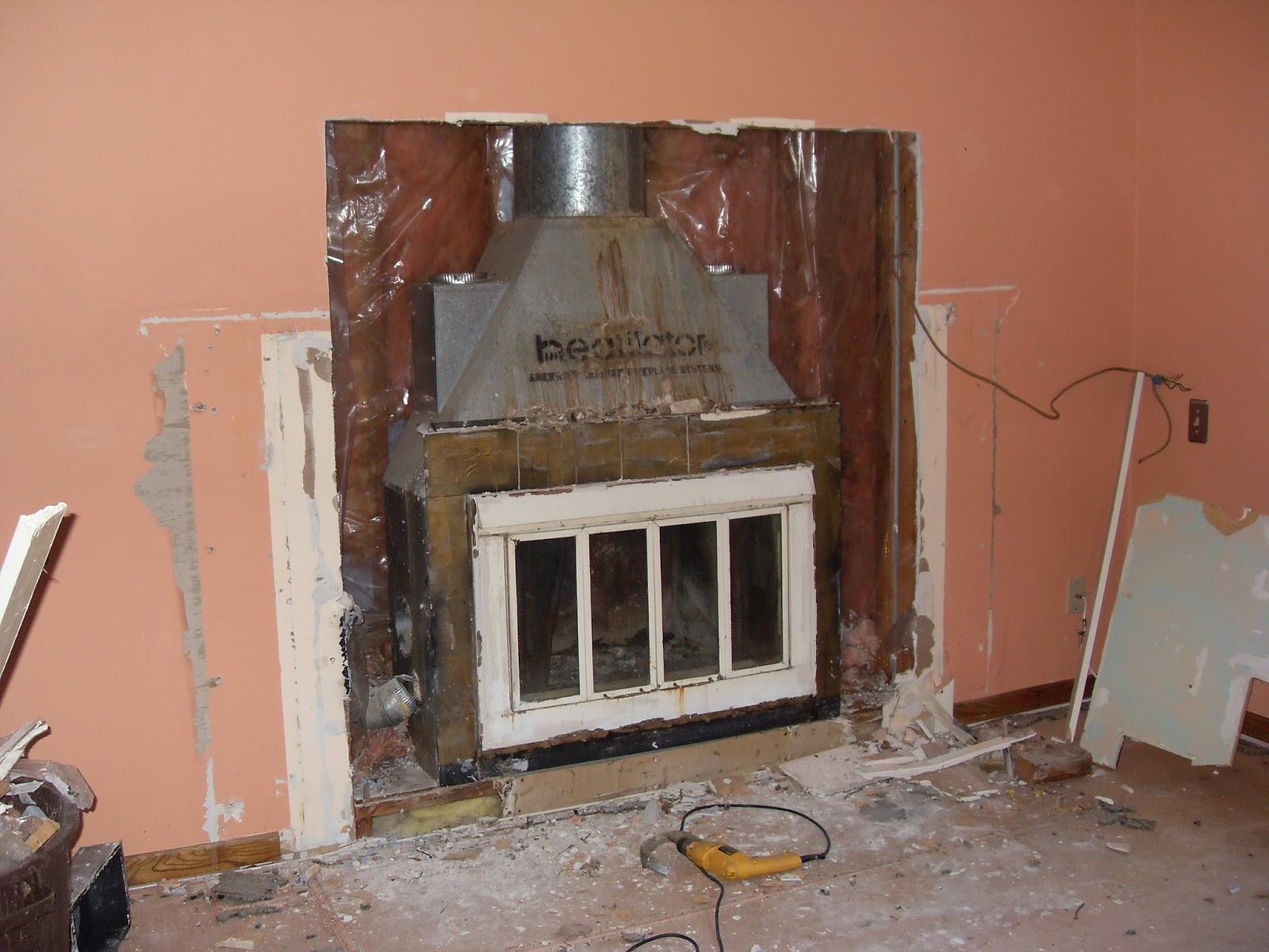 Comet Circle Renovation Fireplace, Living Room Floor and Siding Removal