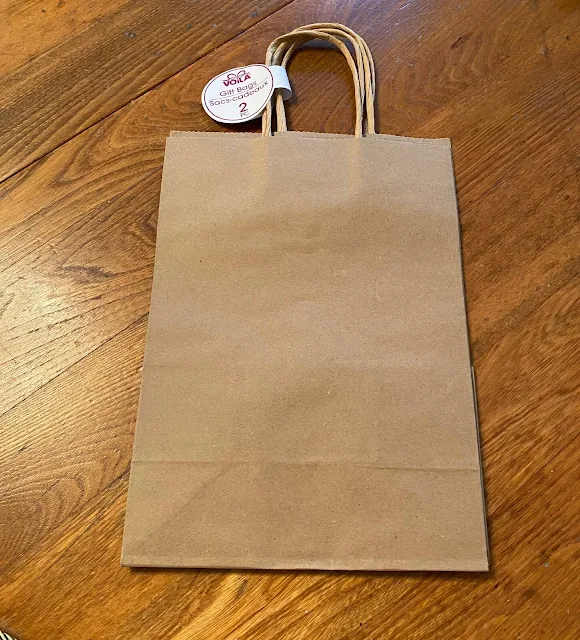 Photo of two plain brown paper gift bags
