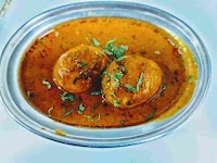 Serving Dhaba style egg curry