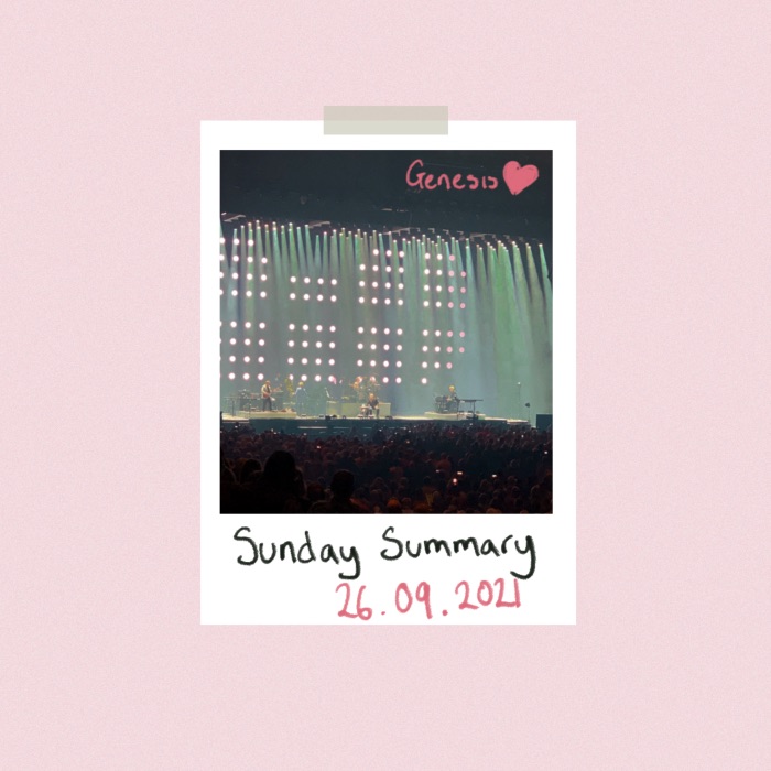 Polaroid picture on a pink background with the words 'Sunday Summary 26.09.2021' written underneath. Photo is of a band playing on stage with bright stage lights shining down and the words Genesis handwritten above.