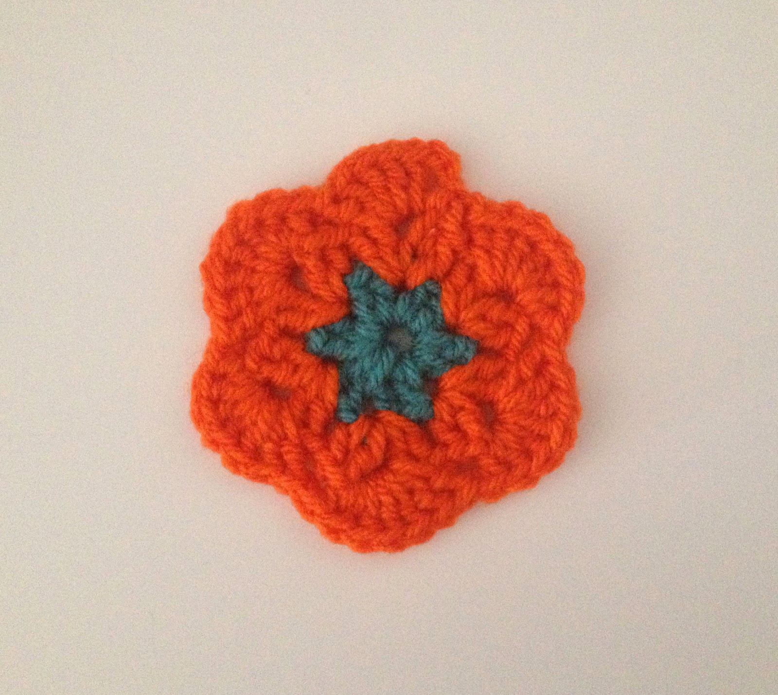 Flor de lana de crochet