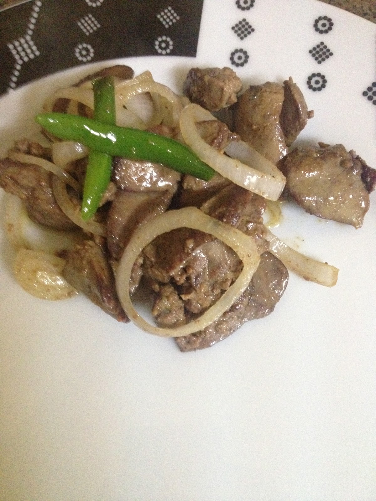 Mauritian and Fusion Cuisine Chicken Liver with onion rings