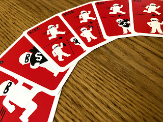 A selection of robber action cards from the game How to Rob a Bank.