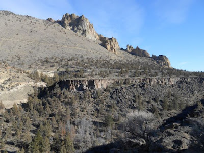 sagebrush, conifers, rocks, buttes,