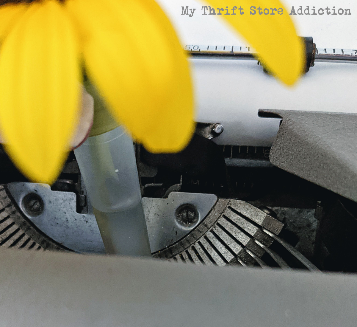 vintage typewriter with fresh flowers