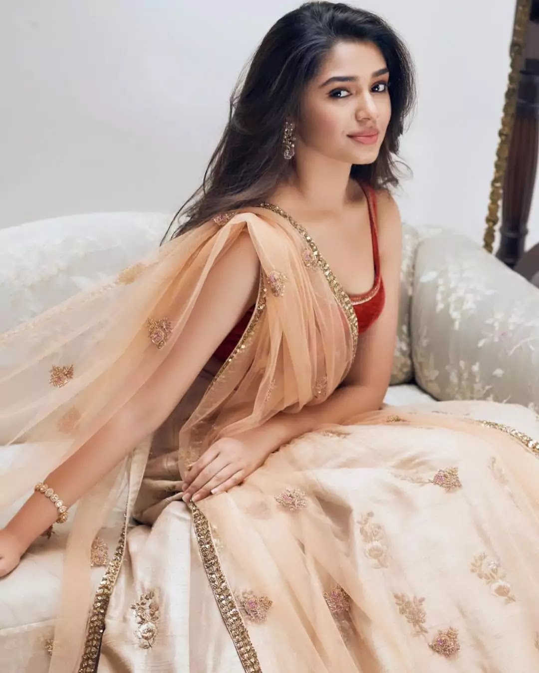 Kriti-Shetty-in-red-cream-lehenga Kriti-Shetty-in-red-cream-lehenga