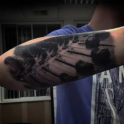 Black Lines Musical Lineup Forearm Tattoo