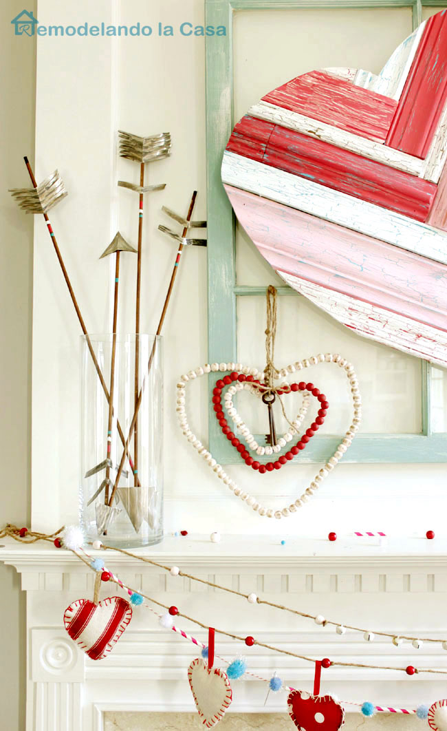 Valentine's day mantel with rustic arrows and hearts