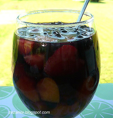 homemade sangria - summer cocktail of fruit, rum and wine
