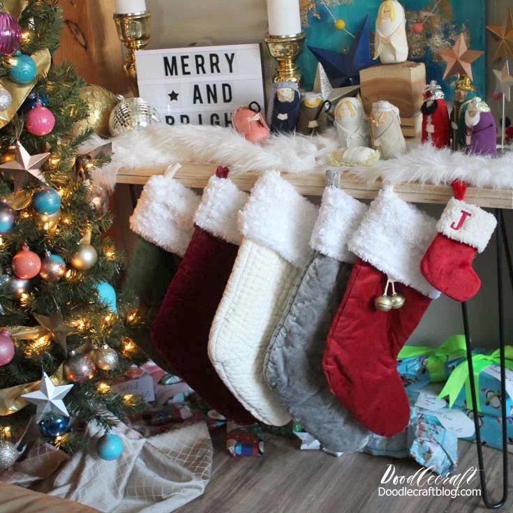 Decorated Christmas stockings with a little fabric paint and some buttons!