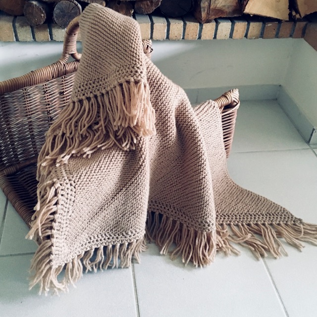 Beige knitted shawl