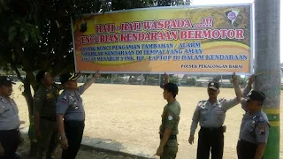 Minimalkan Tindak Pencurian Di Lapangan Mataram, Polisi Pasang Sepanduk Peringatan