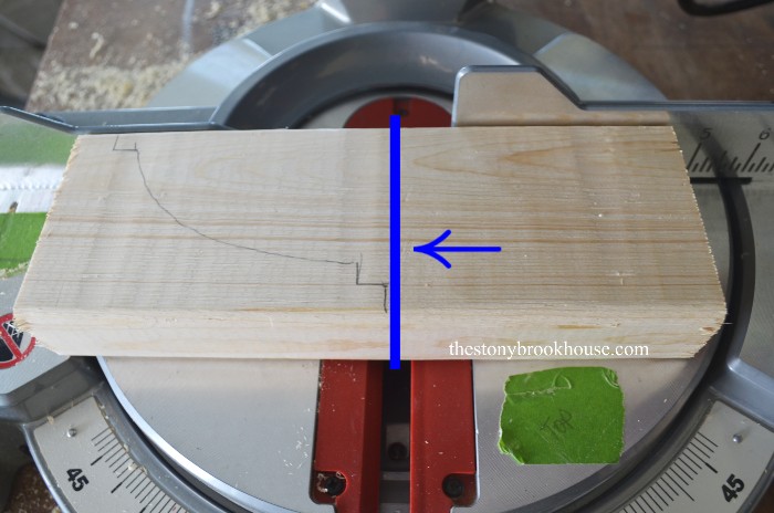 Cutting off excess wood with miter saw