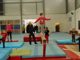 gymnast walking on beam