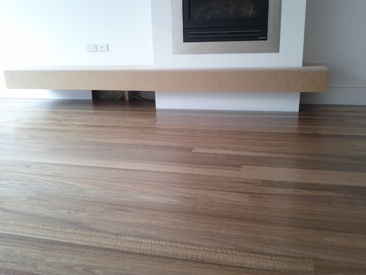 House Reno 2013 25 October. Floorboards polished final coat.