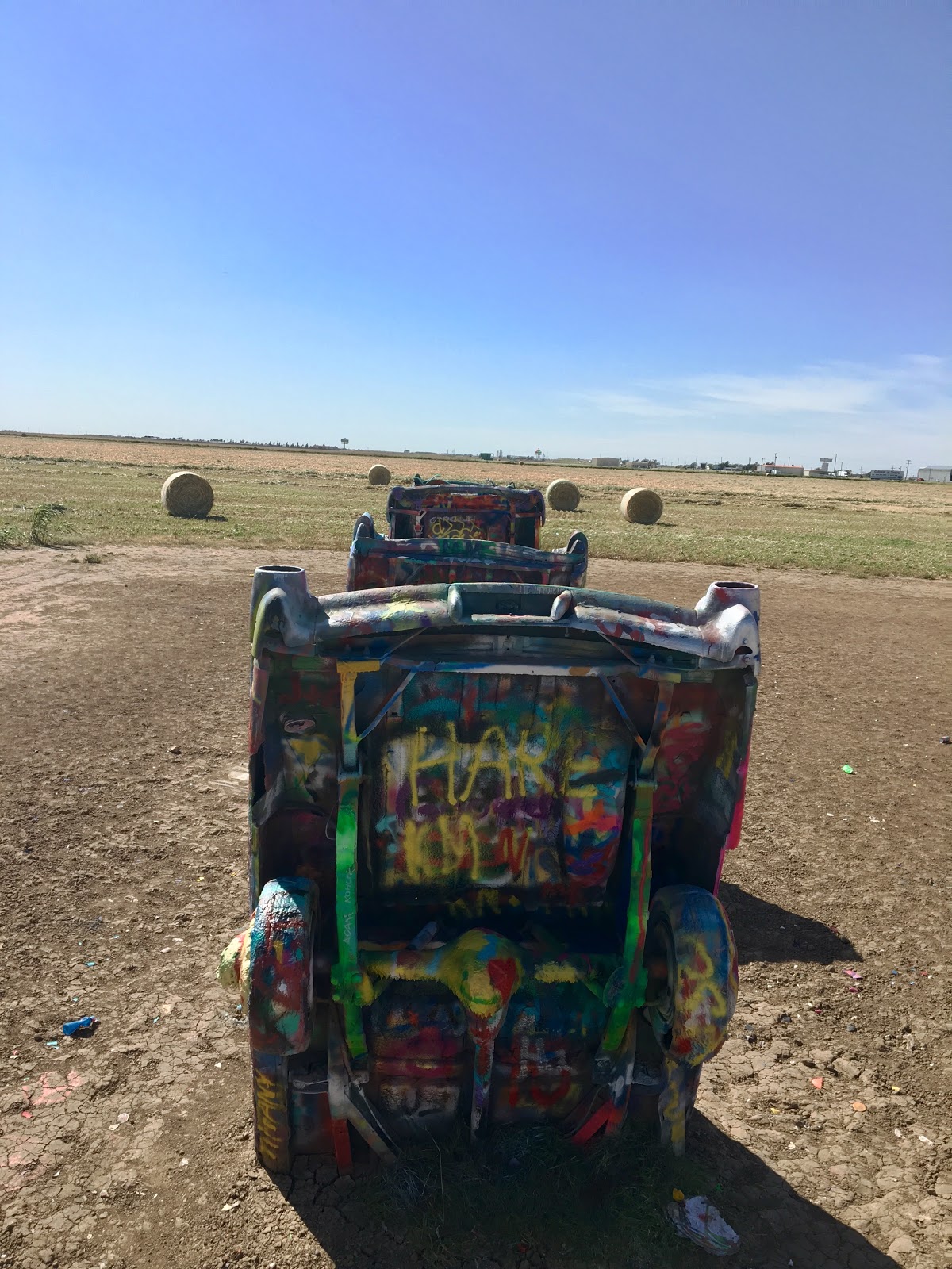 Cadillac Ranch, Texas. Where spray paint, graffiti, and size matter!