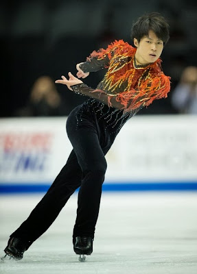 Tatsuki Machida (JPN) udfører sit lange program ved Skate America 2013