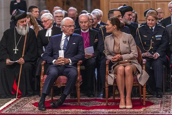 Crown Princess Victoria wore a brown coat and dress by Swedish-Lebanese designer Fadi el Khoury, By Malene Birger pumps and clutch bag