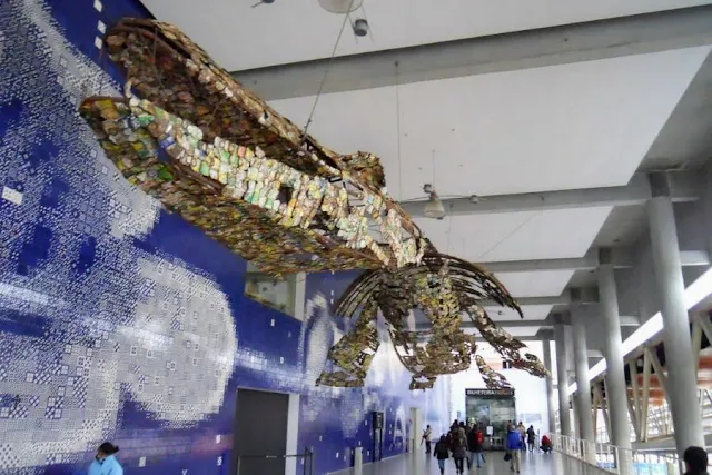 Lisbon for Christmas: giant whale made from crushed soda cans at Oceanário de Lisboa