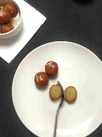 Serving gulab jamun with nuts for gulab jamun recipe