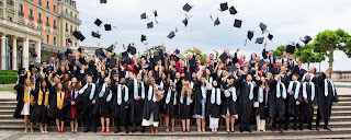 Graduating students standing CollegeForbes Masters Scholarship Post