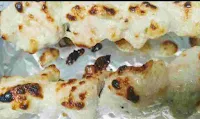 Cooked and roasted chicken malai tikka