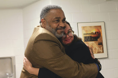 Anthony Ray Hinton, left, embraces Shannon Holliday, coordinator of Shepherd’s Common Reading program. Photo by Emily Daniels.