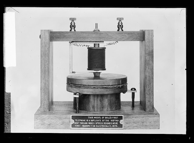 "This model of Bell's first telephone is a duplicate of the instrument through which speech sounds were first transmitted electrically, 1875" on phone. Created/Published between 1915 and 1925. Reproduction Number LC-D420-2586. Detroit Publishing Company, Prints and Photographs Division, Library of Congress.