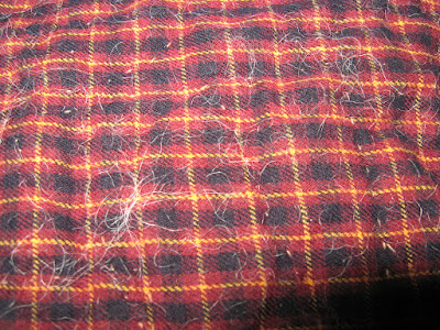 One side of sample quilt with Mountain mist wool/poly batting showing the wool migration to the outside of the quilt