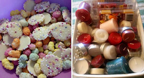 A bowl full of coloured sweets and a box full of wax melts and tea light candles