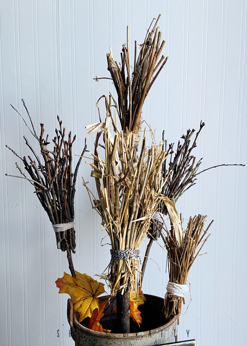 brooms from twigs for halloween decoration